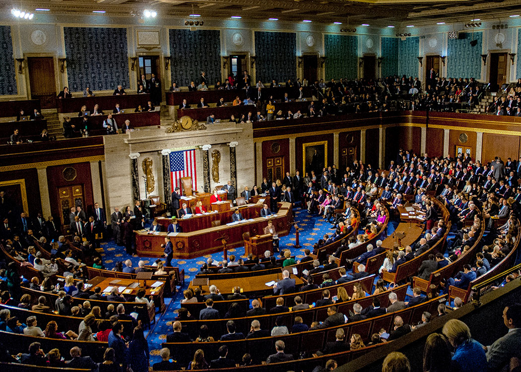 A photo of the main chamber of the United States House of Representatives, full of lawmakers.