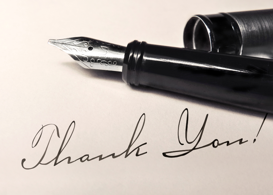 A black fountain pen and the words Thank You! written in cursive.